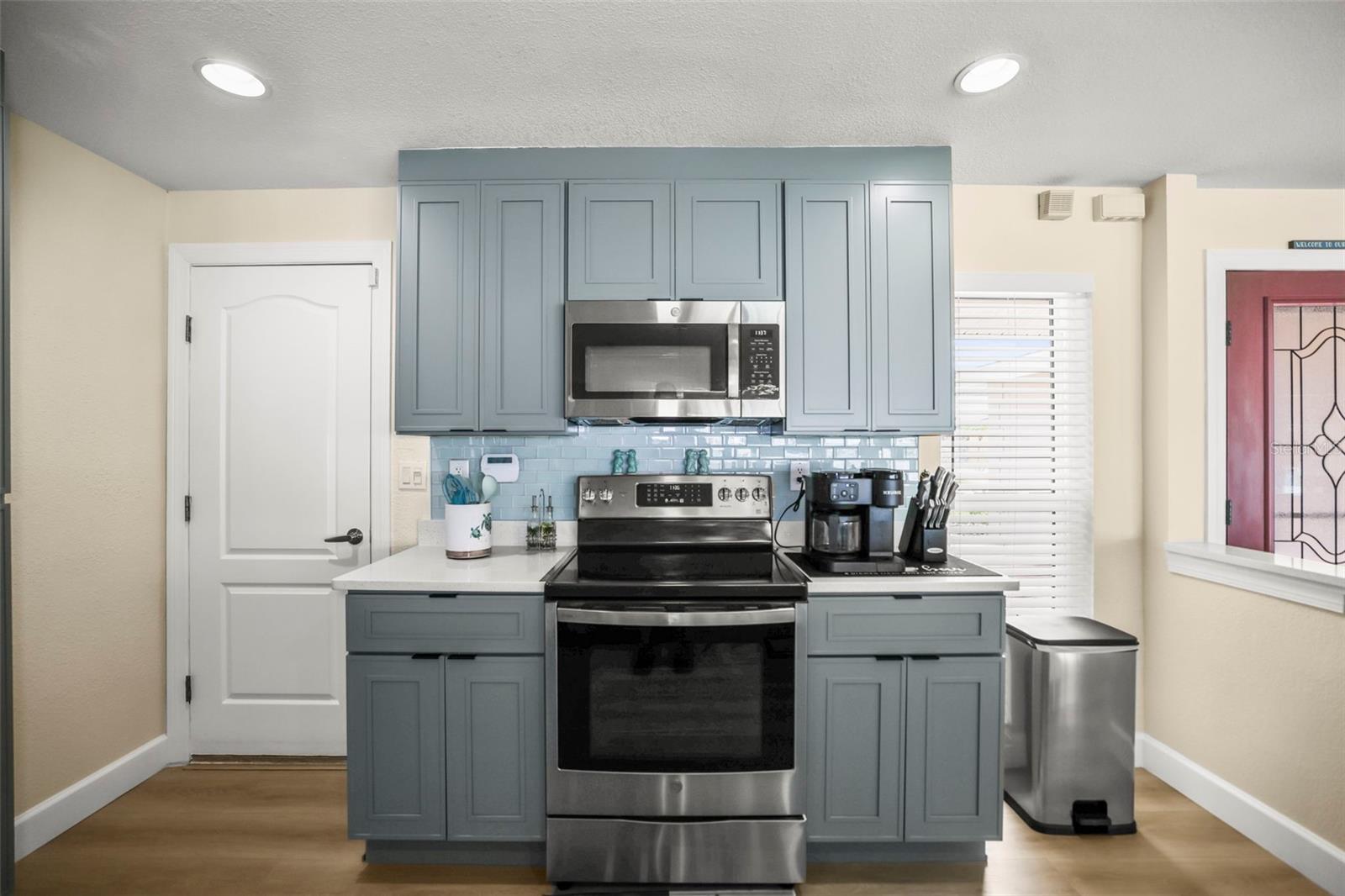 Kitchen facing the range.