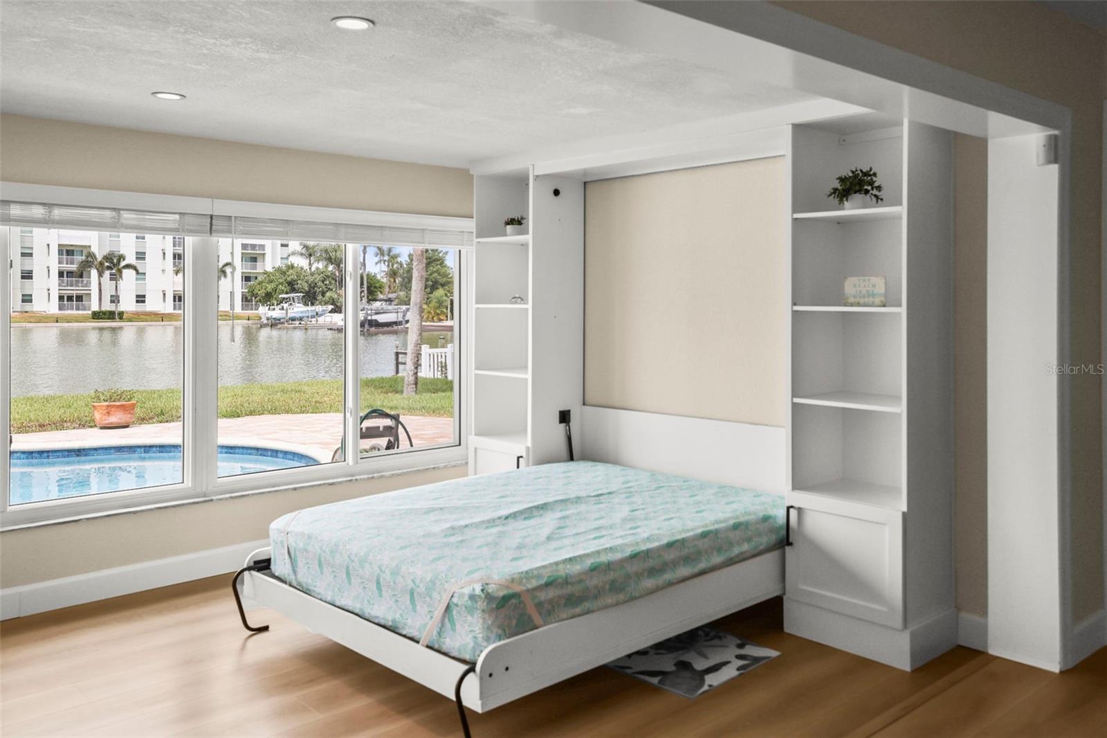 Open Murphy bed in Florida room.