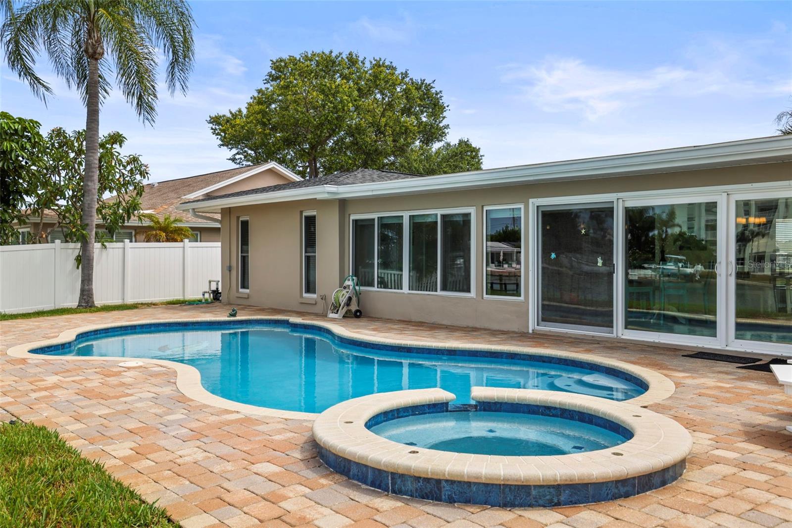 Pool and overflow hot tub/spa.