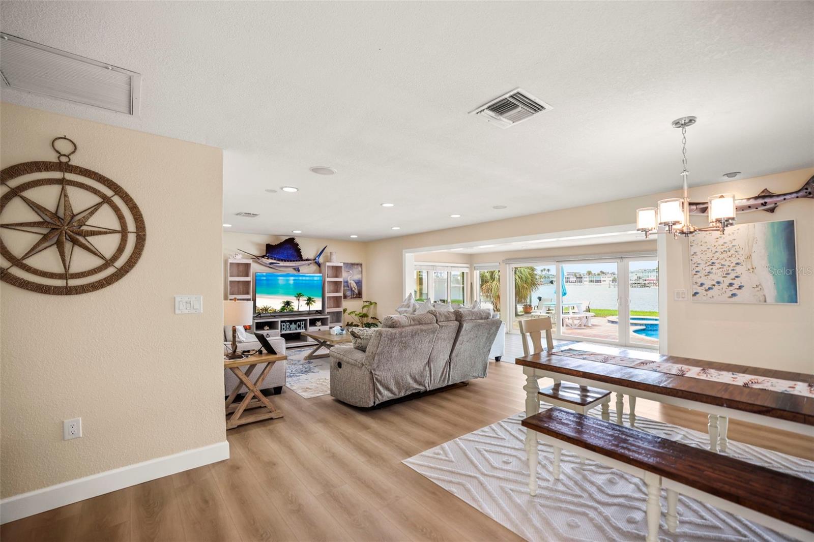 Diningroom with view into the living room and Florida room.