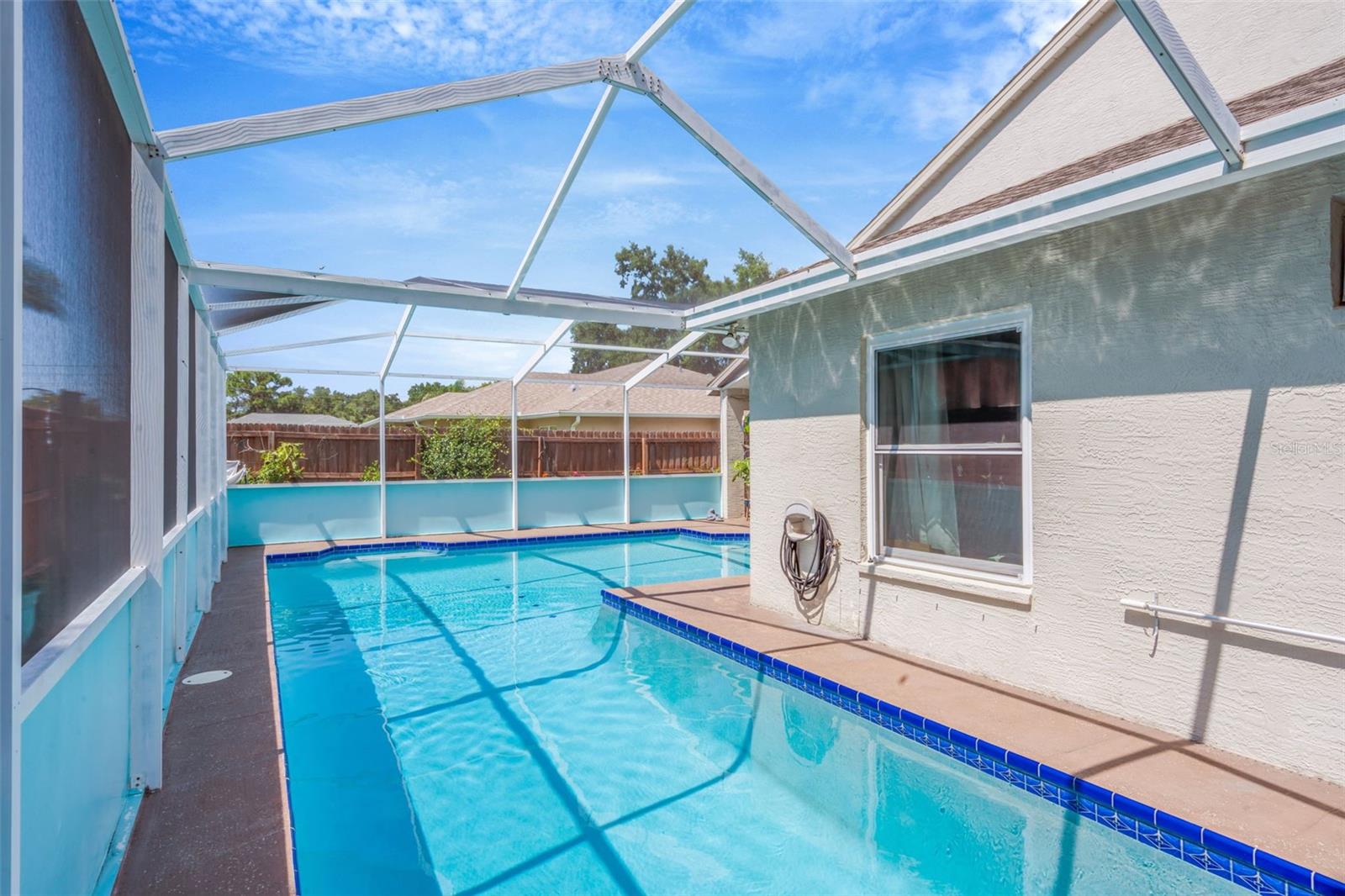 Lap pool with screen enclosure