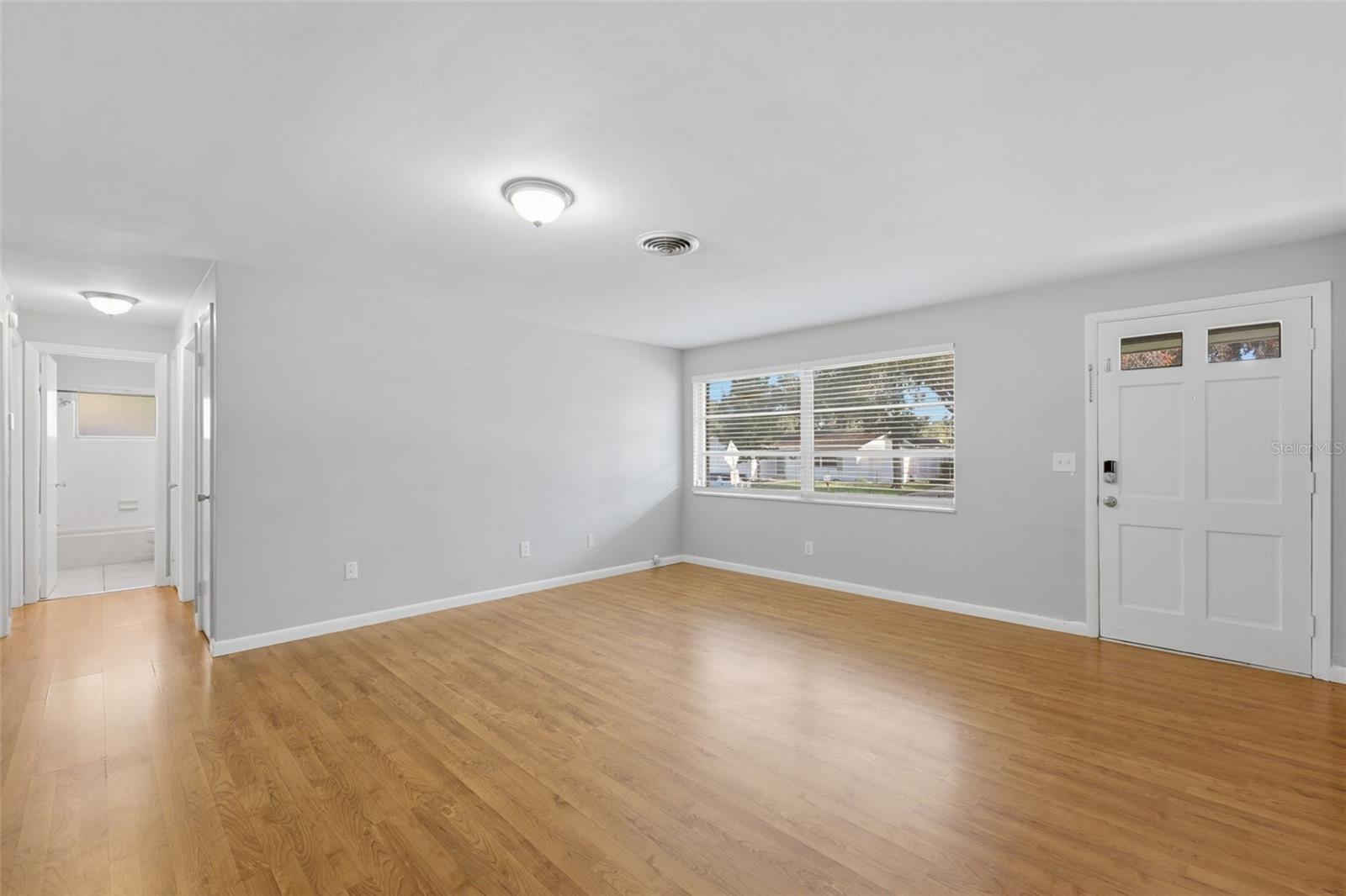 Front entrance, family room, and hallway to bedrooms