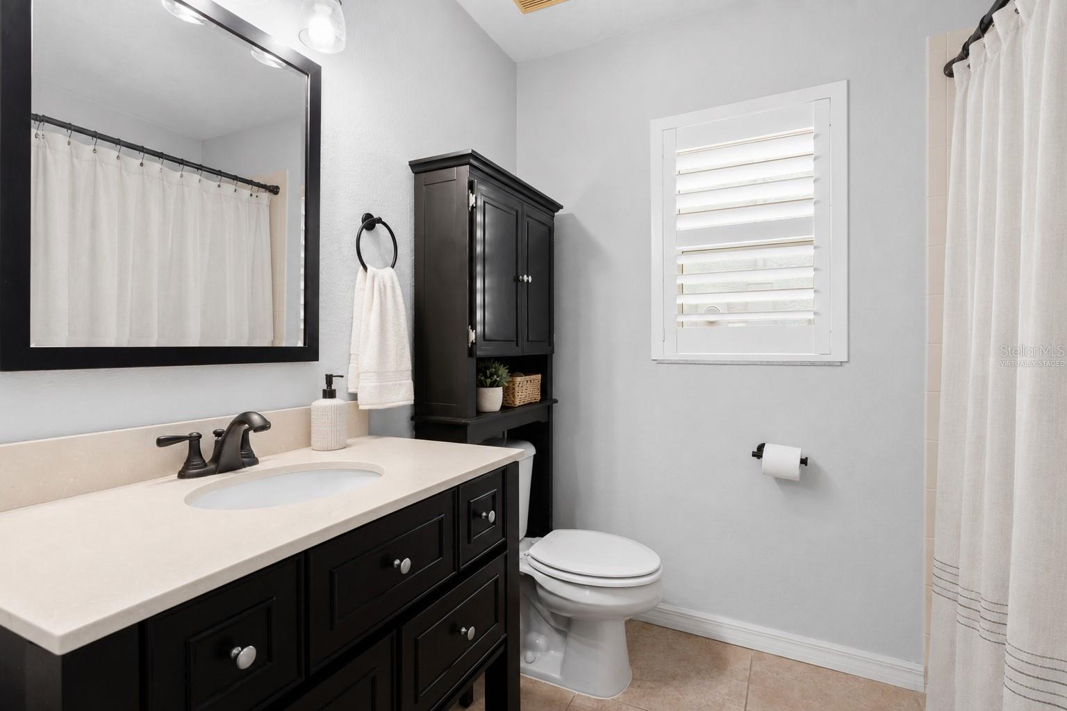 Virtually Staged Hallway Bathroom