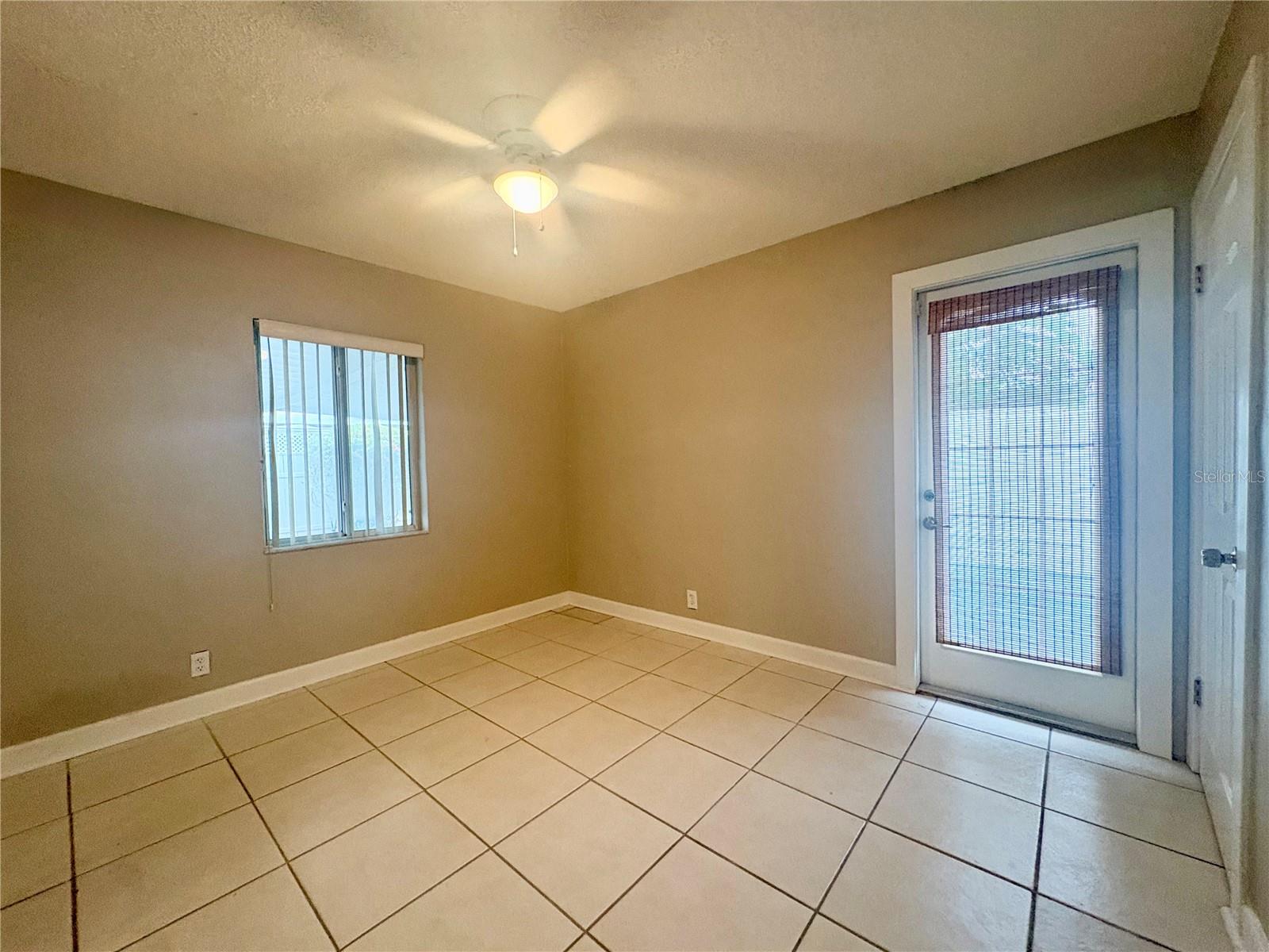 Primary Bedroom - door opens to private fenced patio