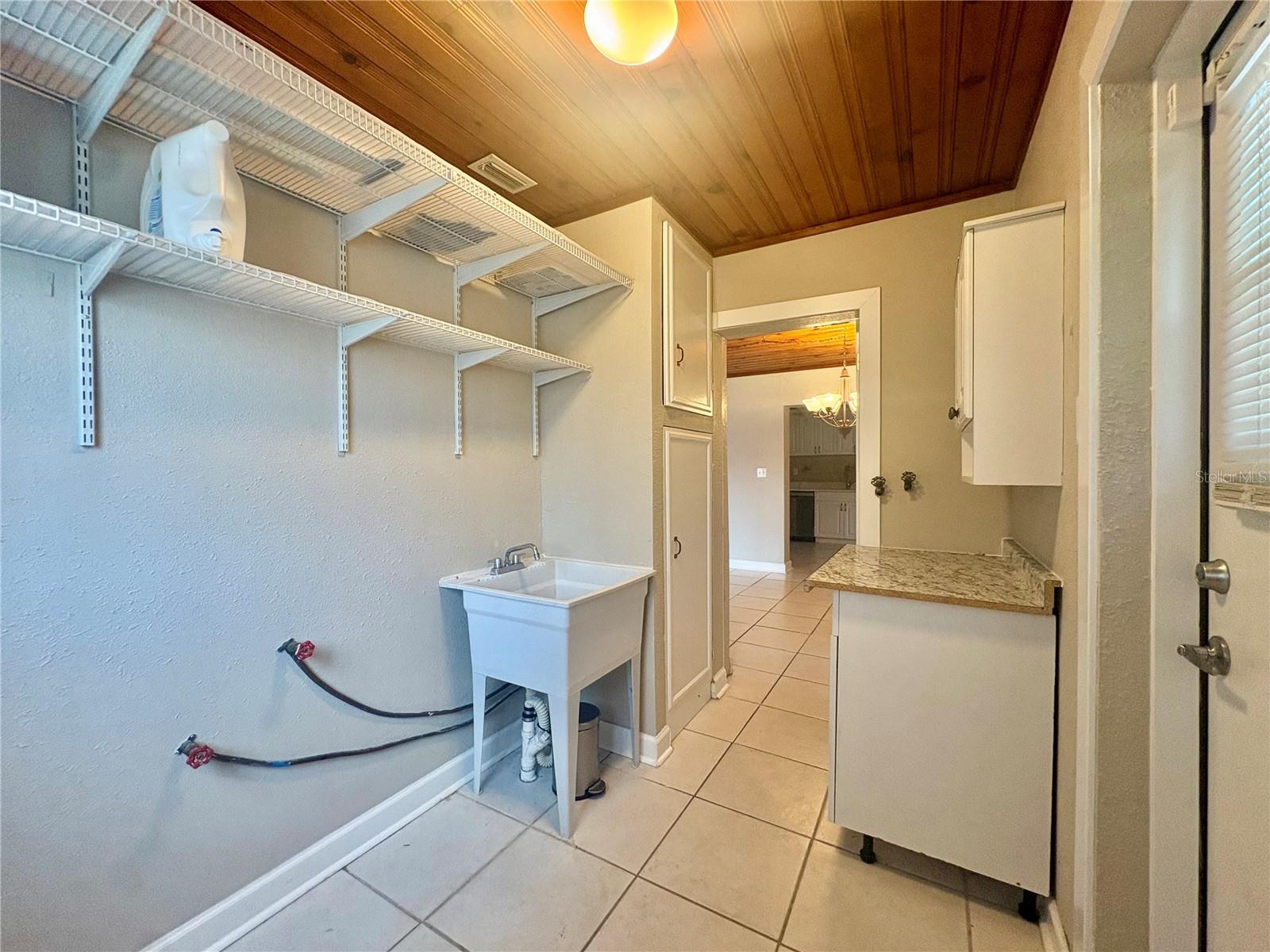 Laundry room with built-in storage & folding area