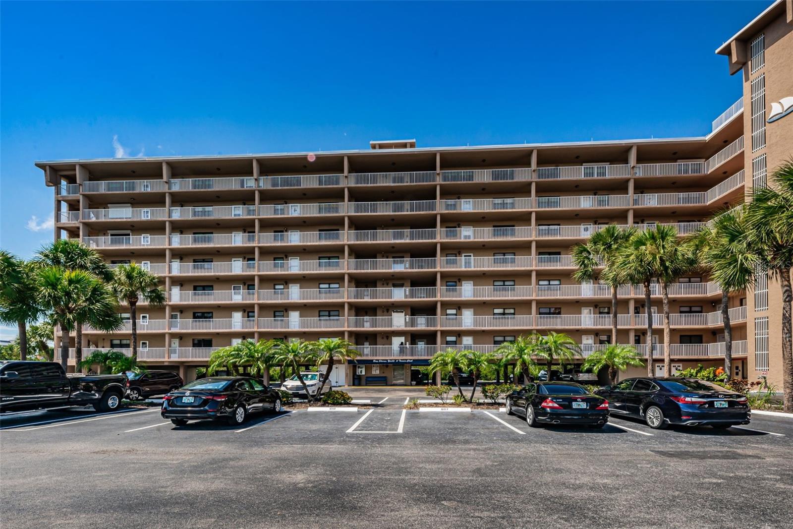 Building Front. Complex is being painted as we speak.  Milestone Report completed in 2024..  Owners were assessed $30,000 each for a complete complex overhaul.. All Assessments paid. . . All work finished except the painting.