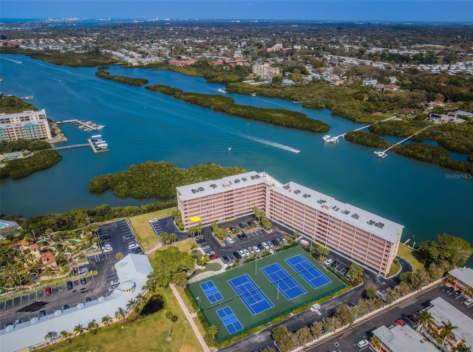 .. Corner Unit # 301.. Perfect for Elevators or Stairs. Water Views for Miles up Intracoastal. Fishing & Boating Docks on other side of Complex. Bay Shore Yacht & Tennis Club lays on a 4.4 Acre Lot.