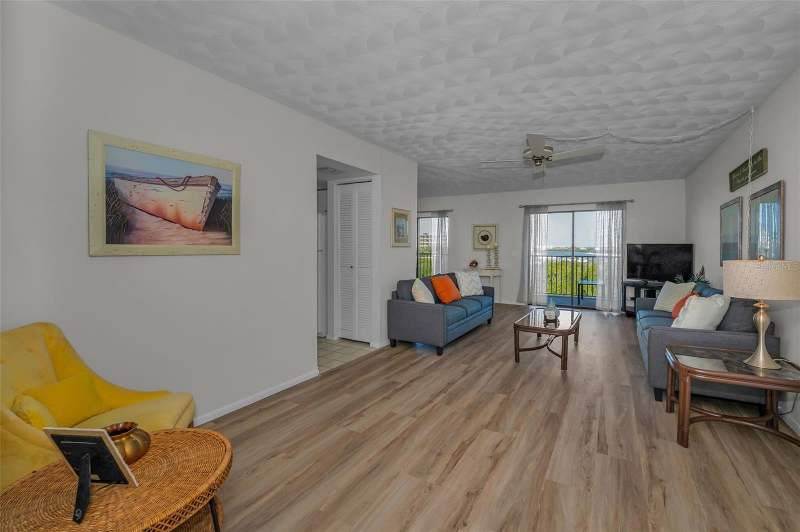 .. Large 23.7 X 11.9 Living Room. Water Views From All Living Areas - Dining Area and Kitchen on Left. Plenty of Room here. Renters & Full Time Occupants Love the extra space the Corner Units Offer.
