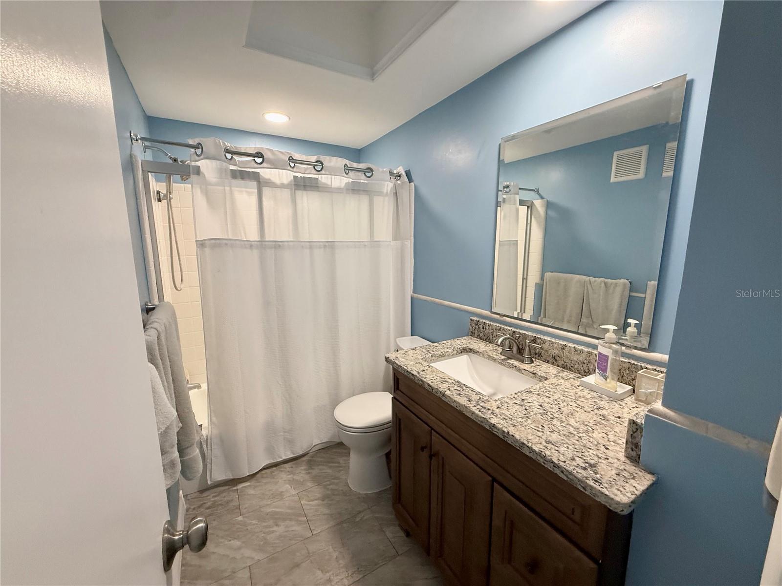 Full Bath w/ tub n glass sliders