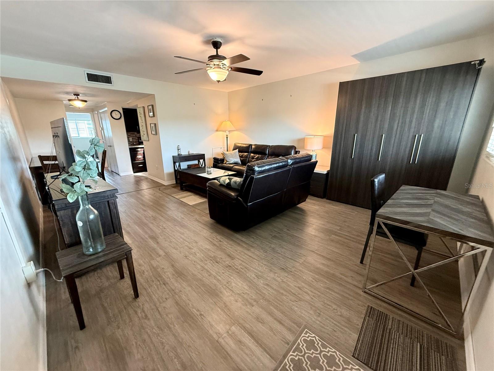 Spacious living area with luxury vinyl flooring