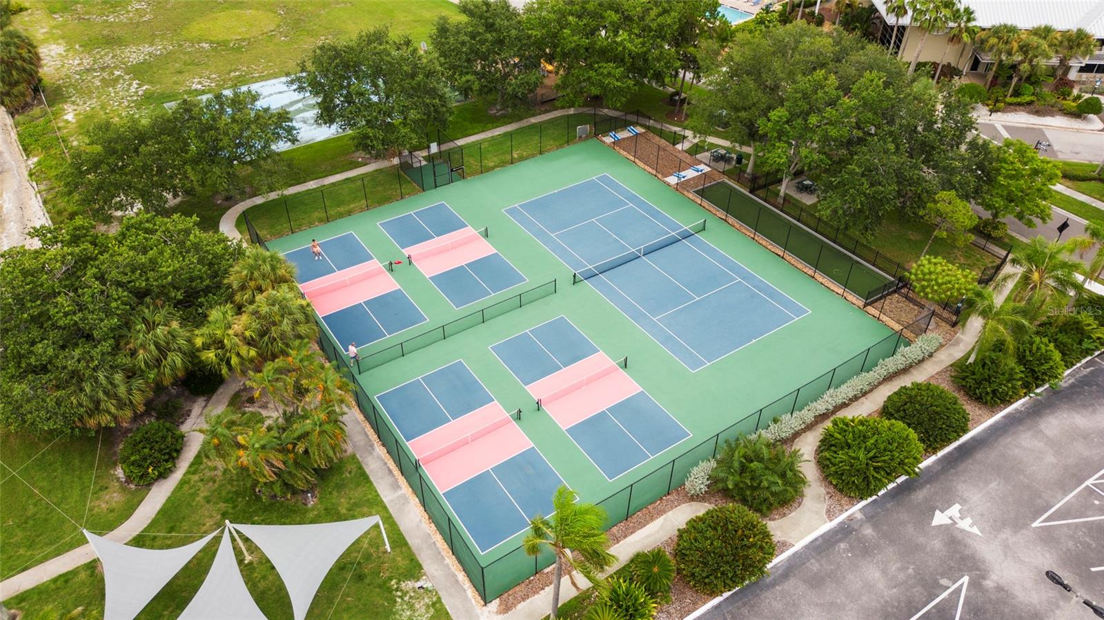 Tennis, Pickleball Courts, Lawn Sports', and Playground Area on Tampa Bay