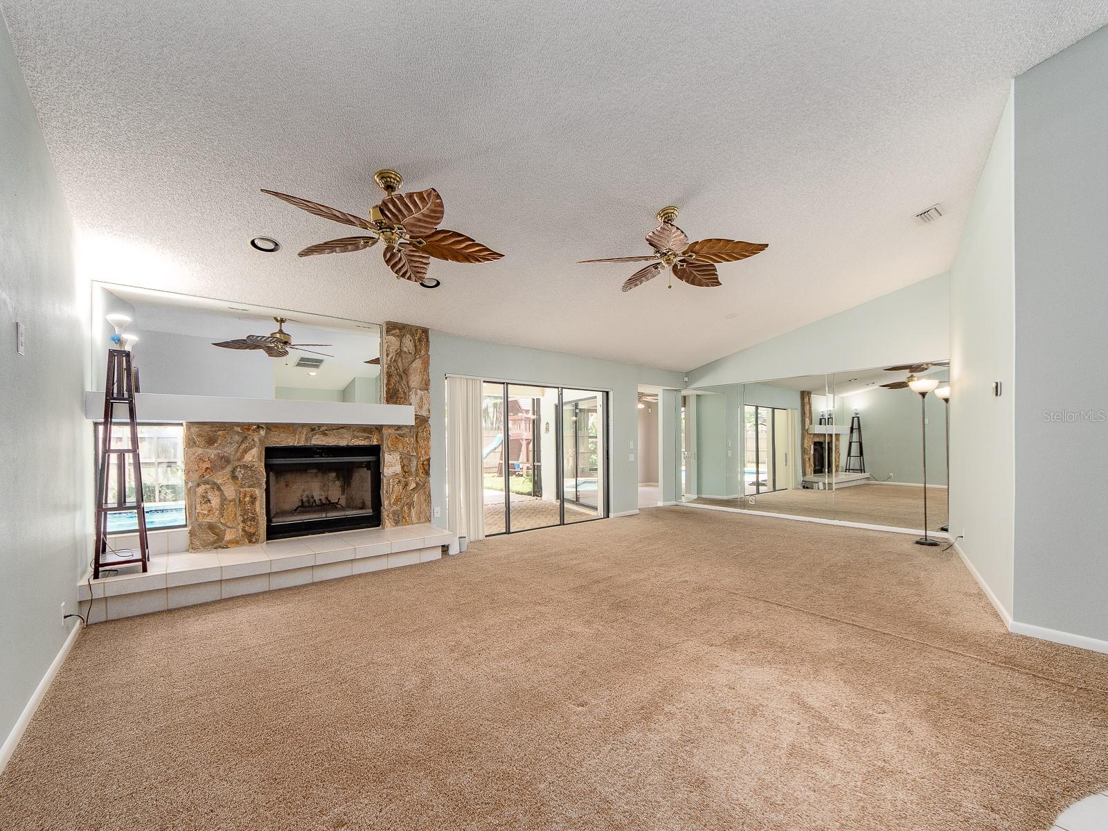 Great room with wood burning fire place
