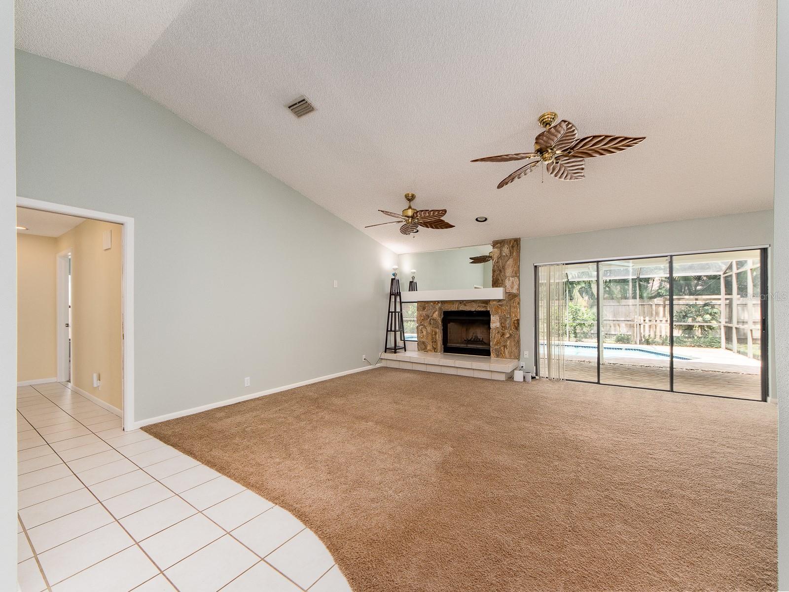 Great room sliders leading to pool
