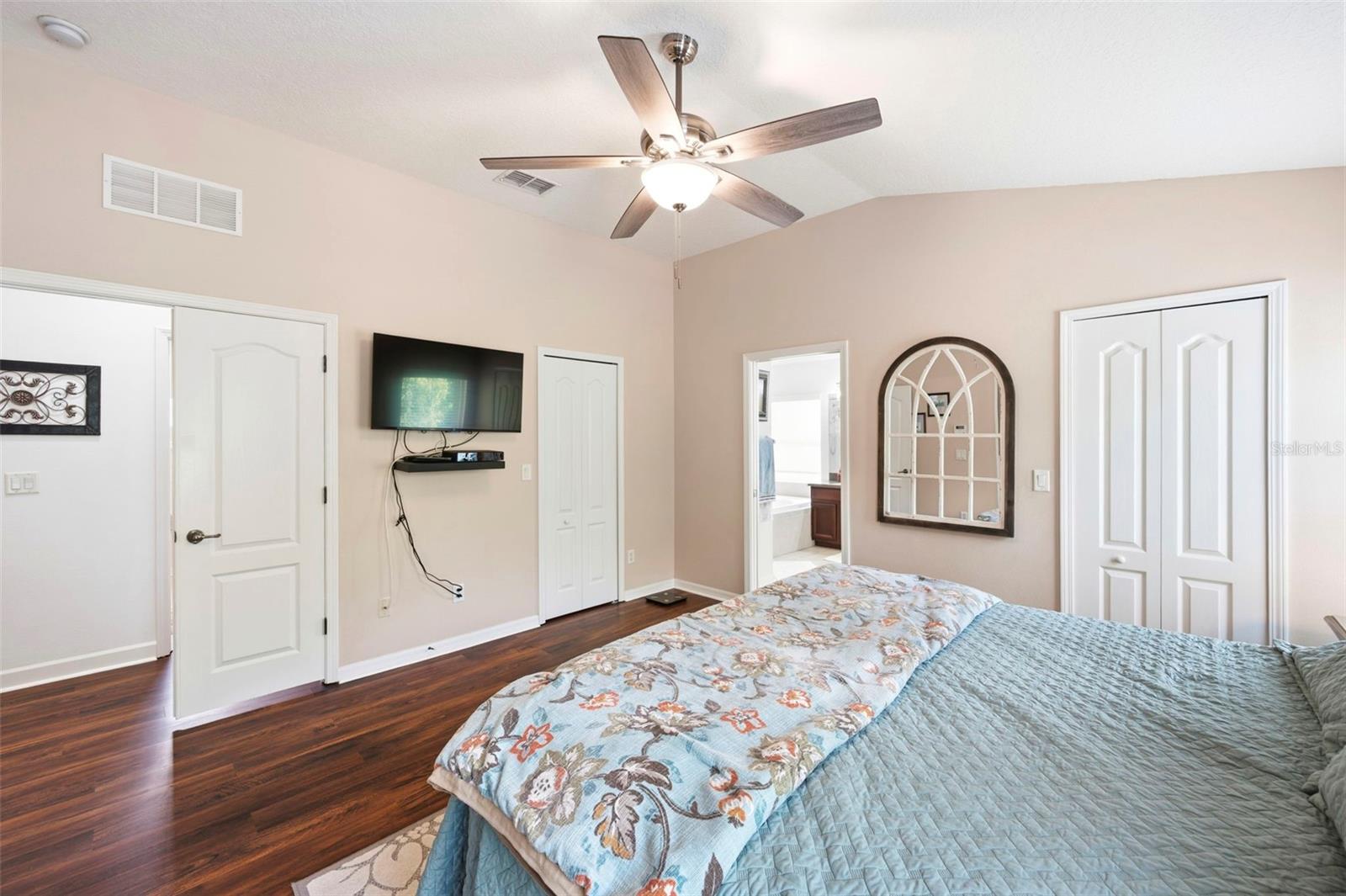Dual walk-in closets in primary bedroom.