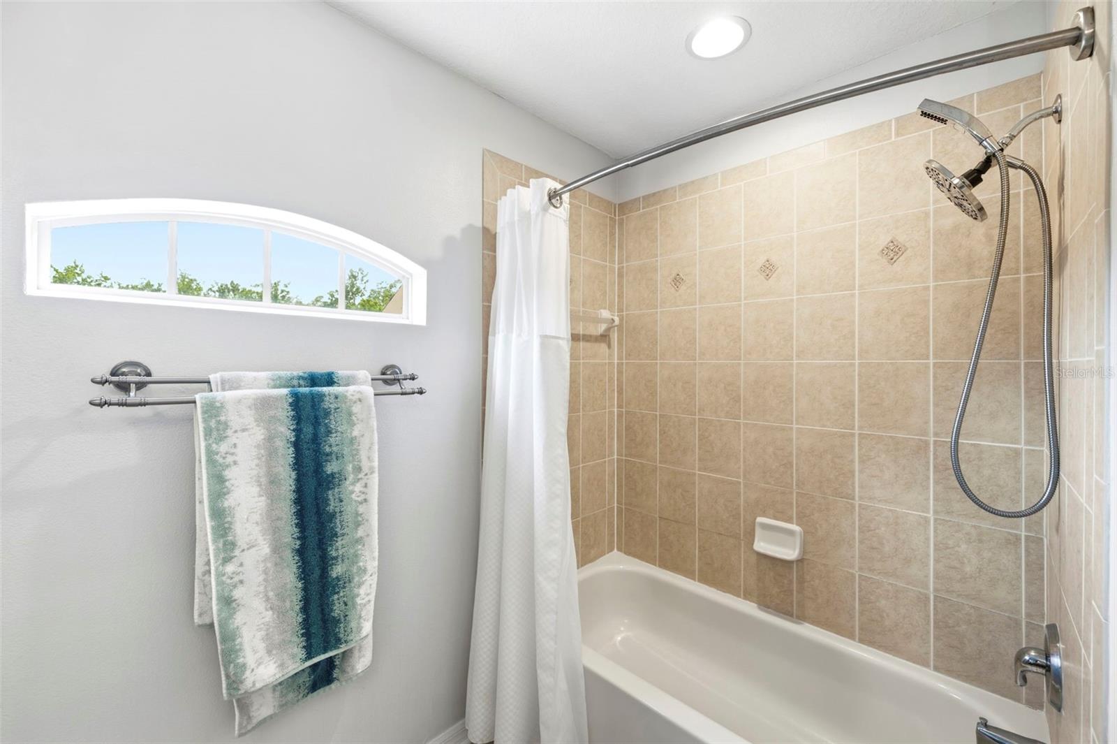 Tub/shower combo in the full bath.
