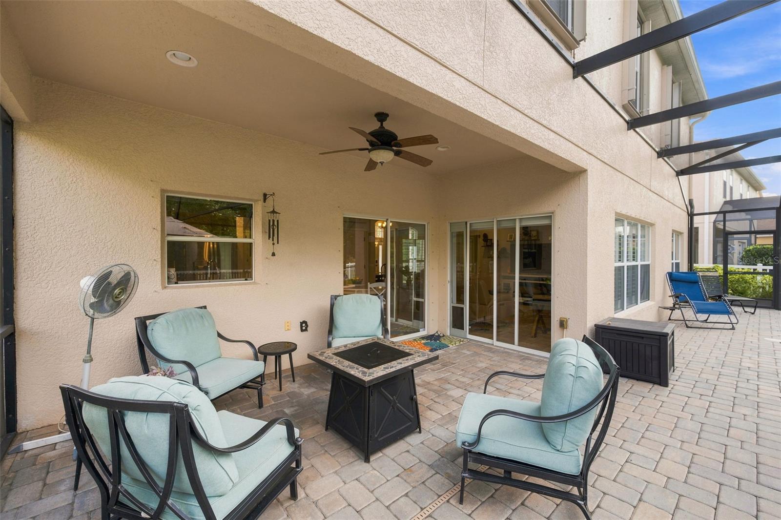 Covered patio area with fan.