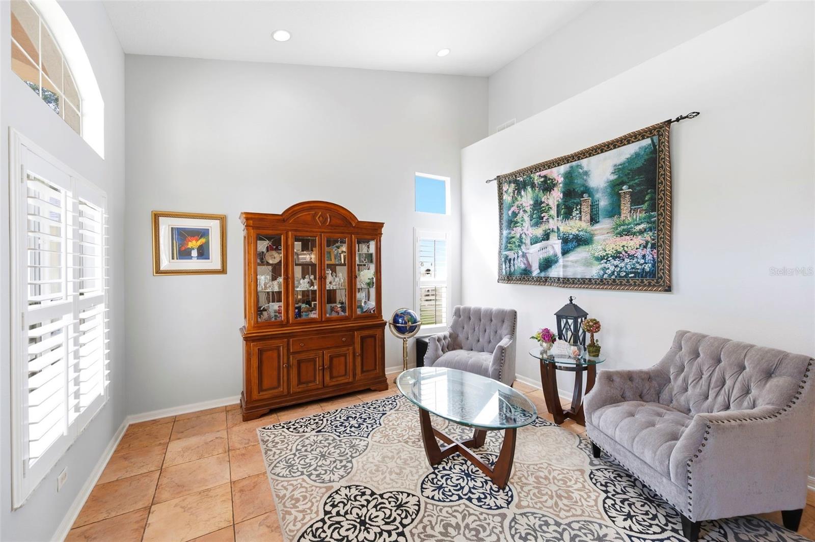 Formal living room has 16' ceiling.