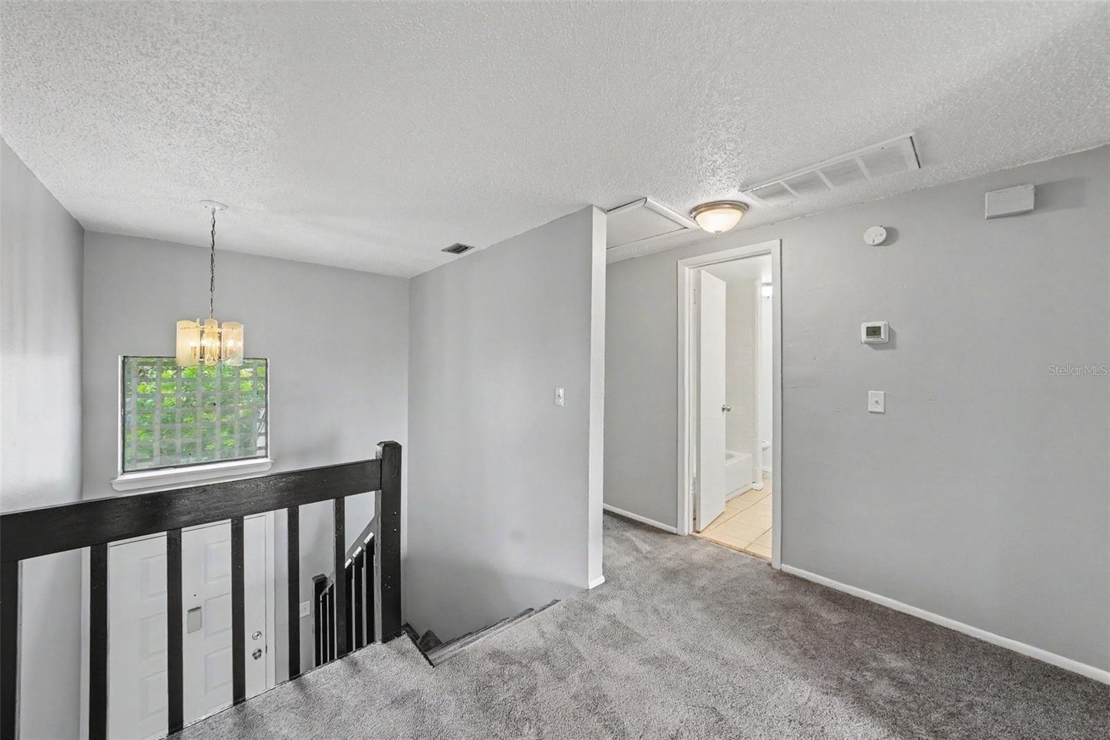 Second Floor spacious landing, with potential office space use.