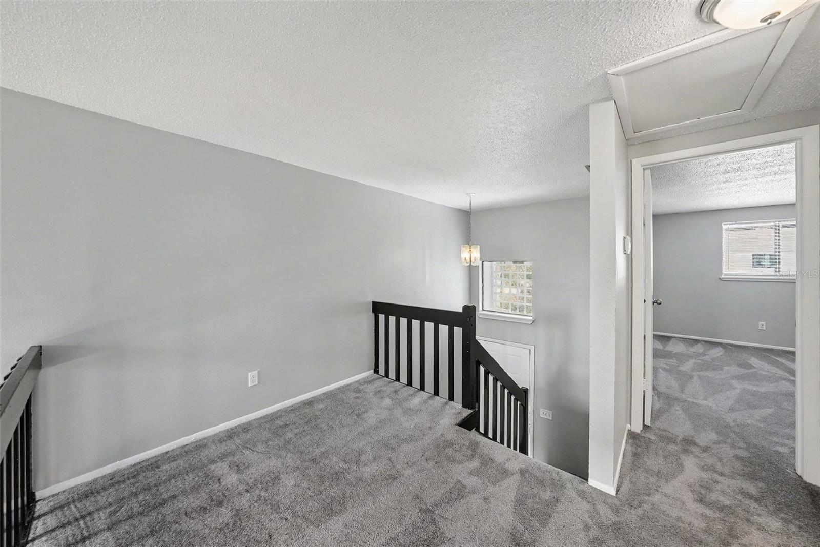Second Floor spacious landing, with potential office space use.