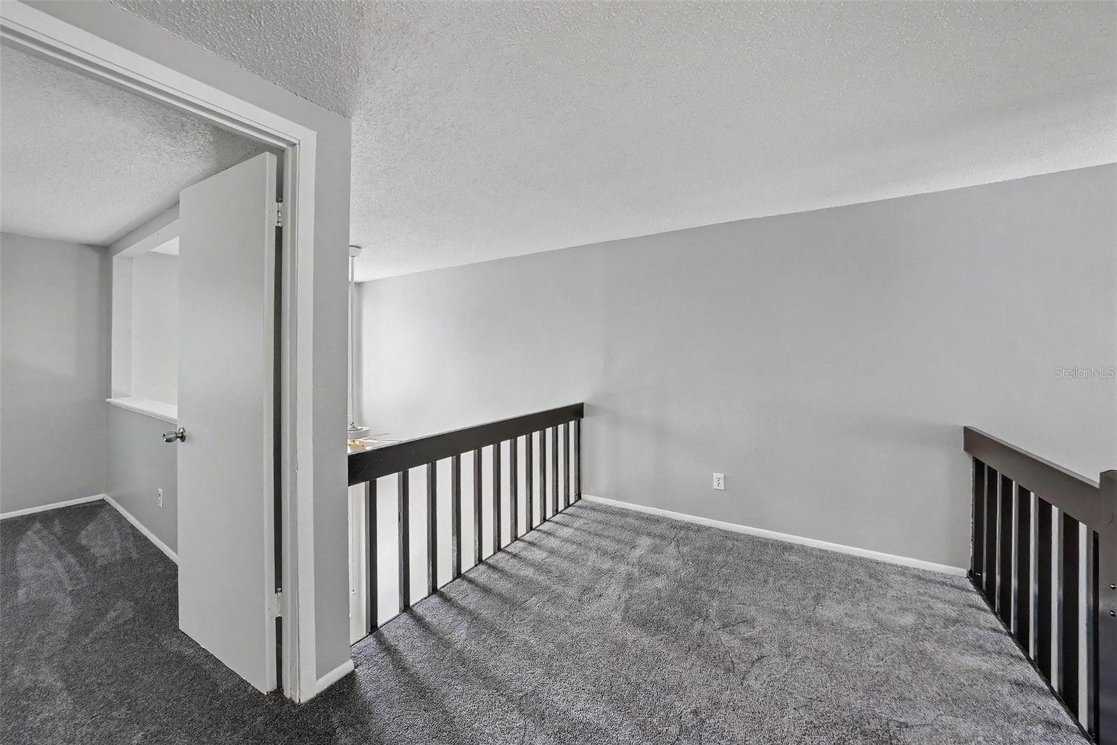 Second Floor spacious landing, with potential office space use.