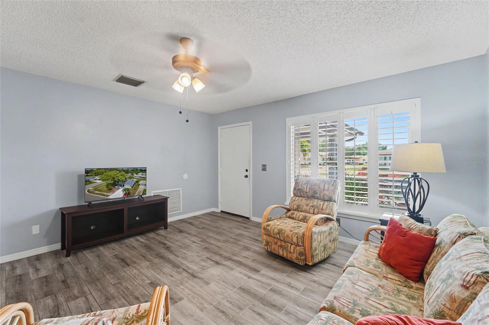 Gorgeous Great Room Window with Plantation Shutters