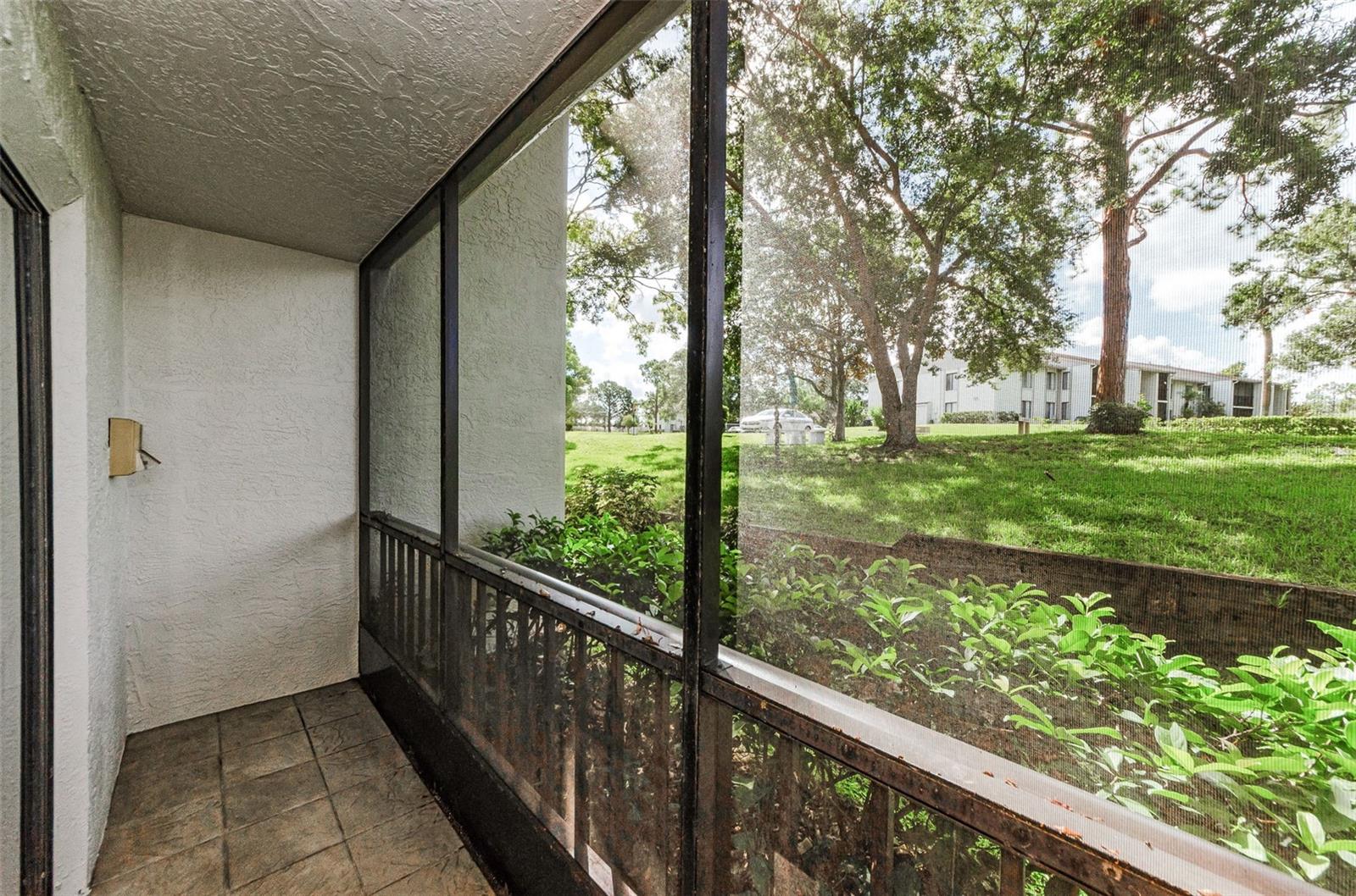 Screened and Covered Porch with serene view