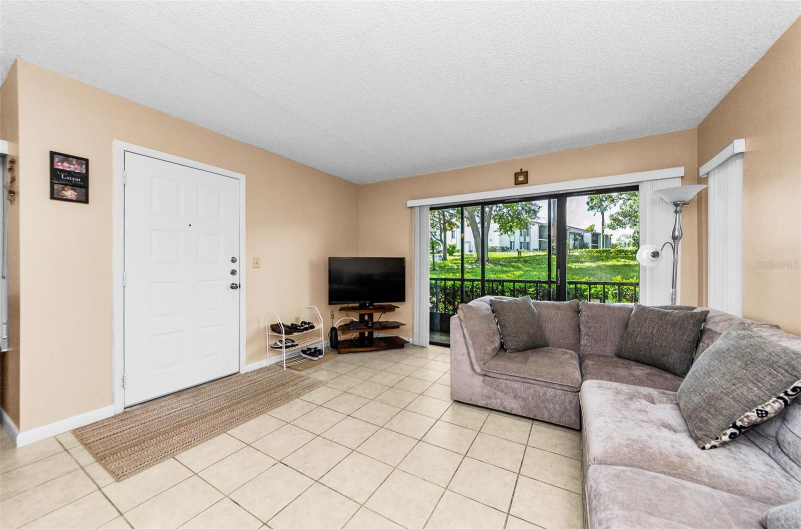 Comfortable Living Room with ceramic tile floors