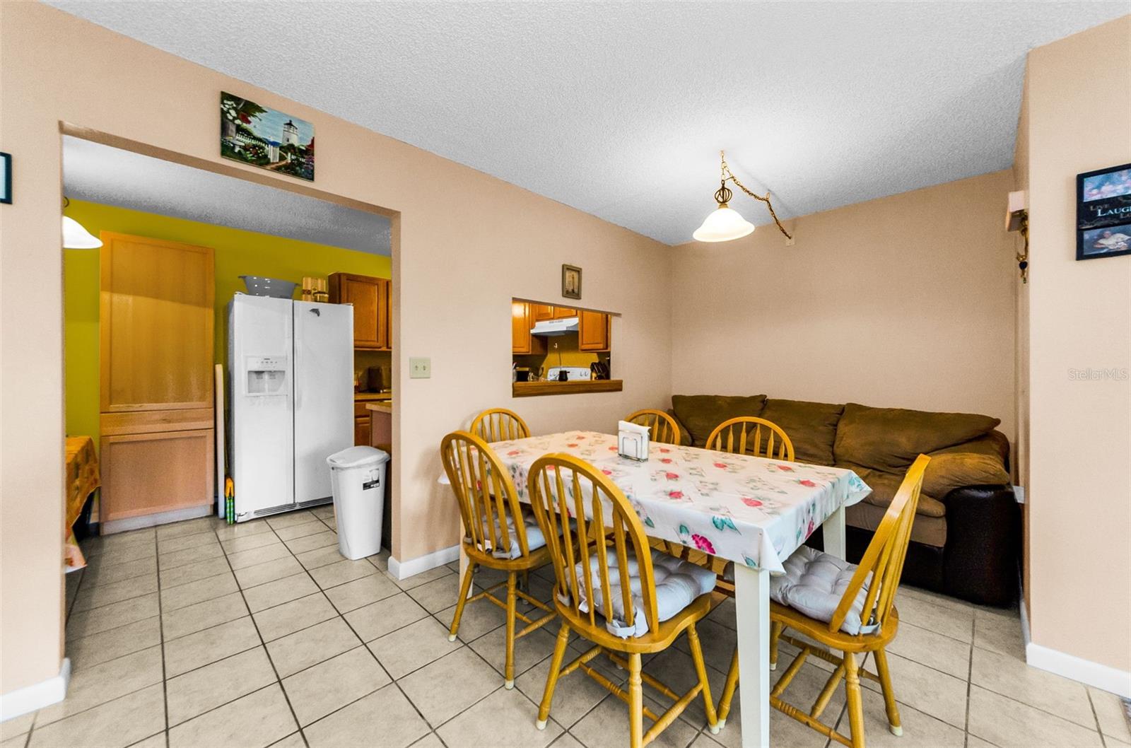 Dining Room opens to the Living Room and next to Kitchen