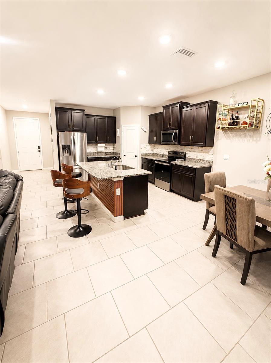 open concept kitchen, dining room and family room