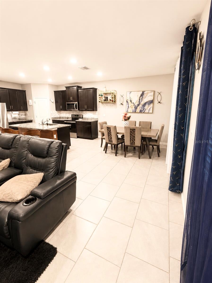 open concept kitchen, dining room and